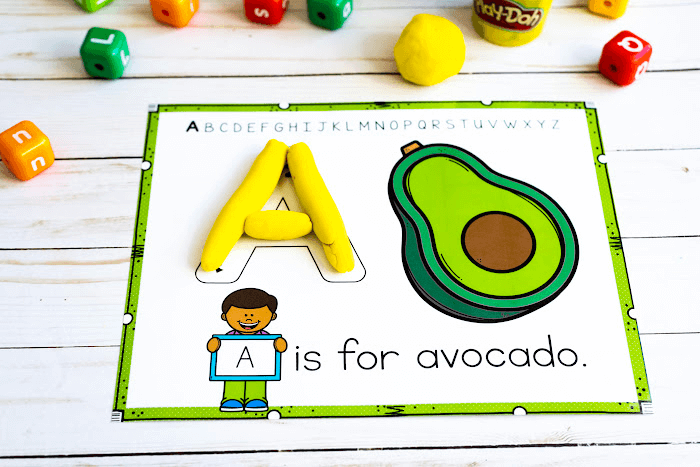 The alphabet play dough mat A for avocado.