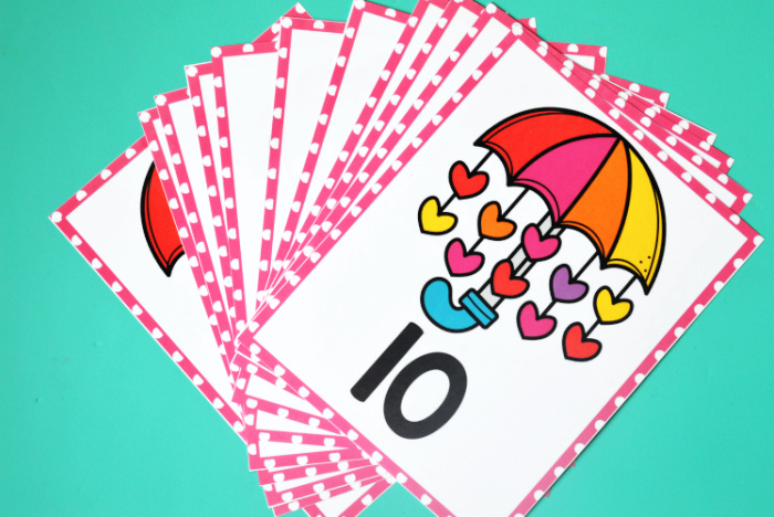 Counting cards and posters with heart Valentine's Day theme