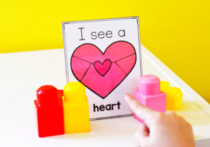 Introduce simple text with these I spy cards. Invite your child to read the words, "I see a heart."