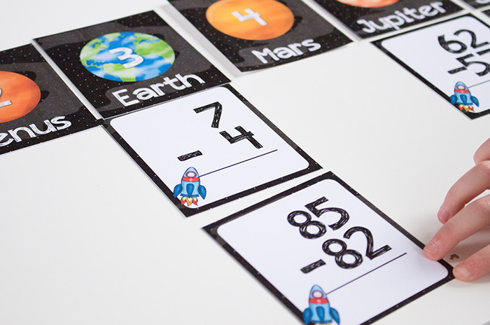 Subtraction matching game with space theme