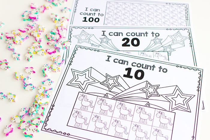Counting grid game for numbers to 100 with unicorn fairytale theme for preschool